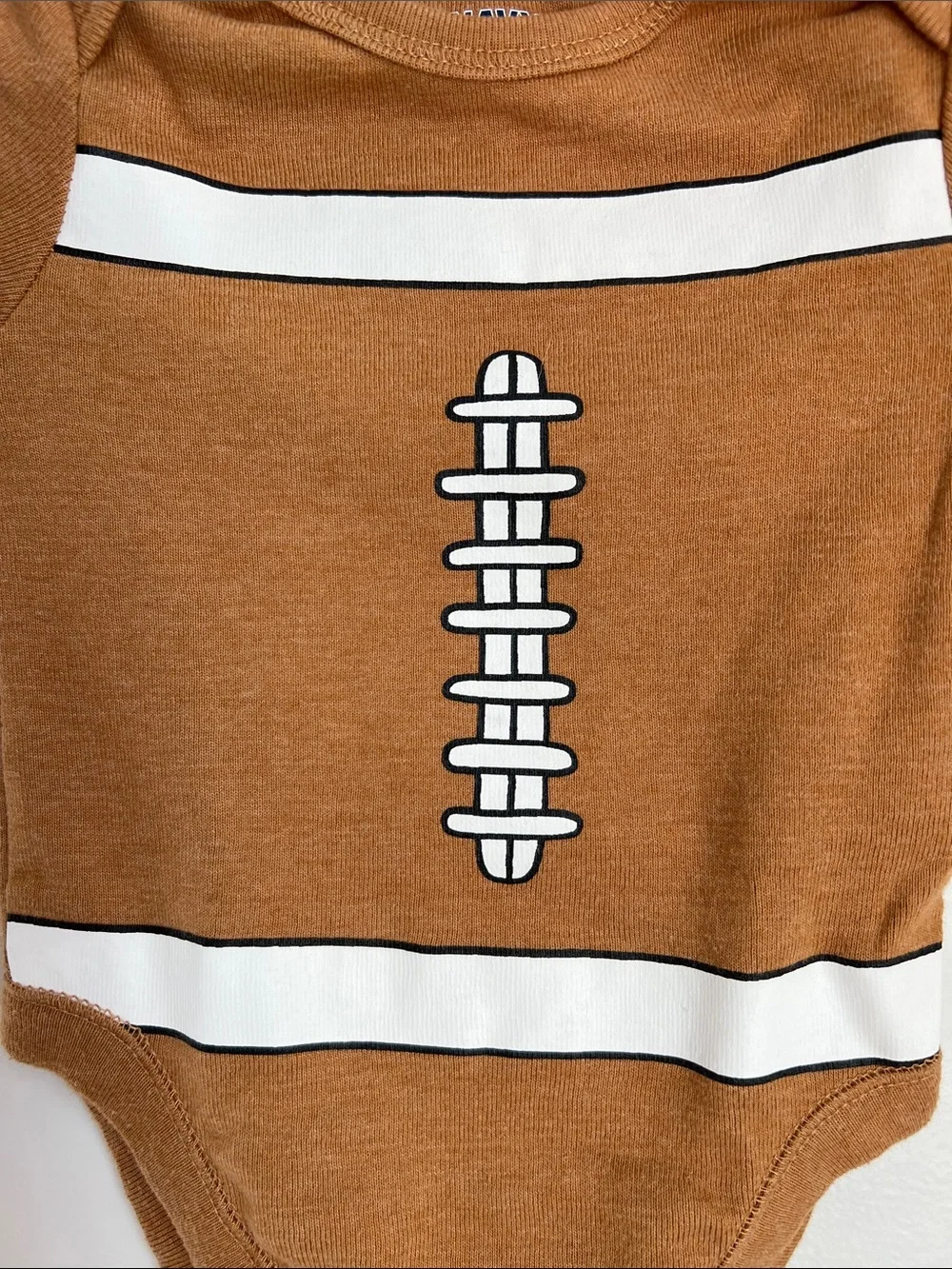 Old Navy | Brown Football-Print Baby One-Piece Size 0-3 Months